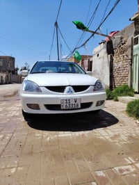 لاانسر 2010 • ميتسوبيشي لانسر • لانسر للبيع • سيارة 1600cc • تبريد ثلج...