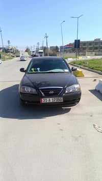 ماشااڵلە هۆدای ئەلێنترا 2002  ژمارە مۆبایل 07726587368