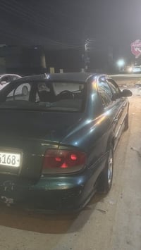 سوناتا وفود موديل 2002 رقم قادسية  مصبوغة احزام بيها طخات مثل ما موضح ...