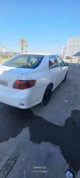 سلام عليكم كورلا موديل ٢٠٠٩ الضرر البنيد مبدل وقطعتين صبغ الجاملغات المامية وبيها الباب الورة بي طخة موضح بل الصورة  شواصي لغود مقفولة مكينة صدر تبريد تاير كير كلة مكفول بسمي بيها منضومة الغاز سيارة خير من اللة السعر ٩٥ بيها مجال بصيط *********** مكاني بغداد مدينة الصدر
