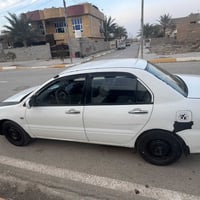 لانسر ٢٠٠٦ • كامله • رقم بغداد