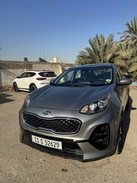 كيا سبورتج وارد امريكي مديل 21  حادثها ضرر ربع القماره اثر سقود عامود ...