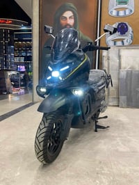 دراجة كهربائية • مدى ١٠٥كم • سرعة ٨٠