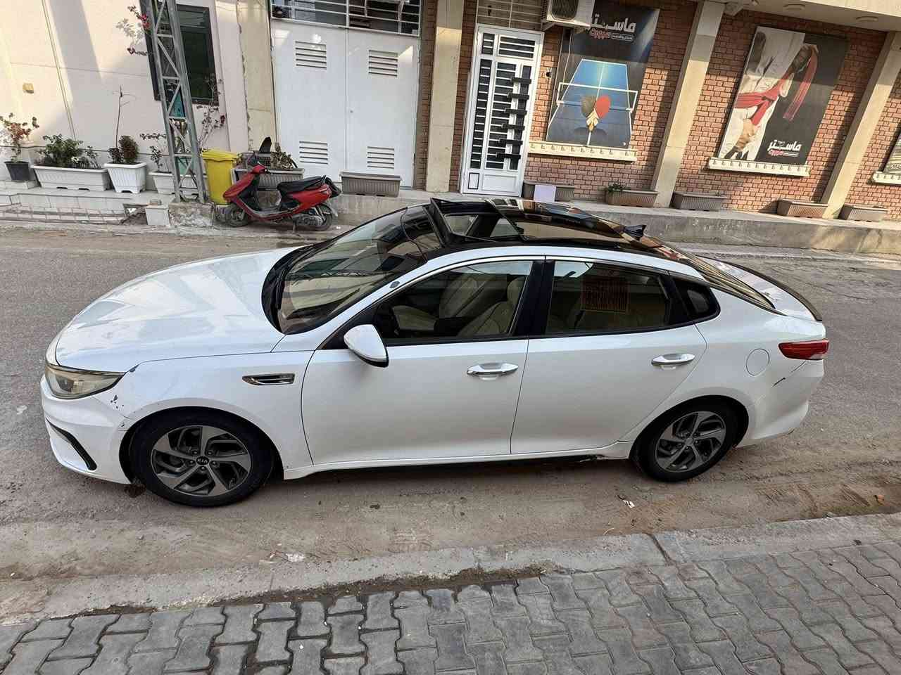 اوبتيما موديل 2016  شكل 2020
مكينة 2400 وارد امريكي 
حادث جدا بسيط يم البك لايت جاملغ الايسر يعني صبغ جاملغ وباب كلير الي بصفه  لان لونه صدفي لازم تلاون ويه الجاملغ
فوووووول مواصفات لمتددد للاخير 
المواصفات 
بصمه 
بنيراما
كشنات تبريد تدفئة 
كشنات جلد كهربائي 
لايت زنون اصلي 
ترحيب 
نقطه عمياء 
كاميرا دواره 
3 وضعيات قيادة.
  سبورت ECO.. NORMAL 
تبريد امامي خلفي 
هيترات 
ثلاجه
كشنات ذاكره 
خزن ميموري 
تحكمات فوول
وبعد هواي مواصفات بيهة السعر 120 وبيه مجال بسيط 
رقم بغداد دولي تحويل ثاني يوم 
مكينة وكير ع حدادية جديده 
تخم تاير جدد باتري جديد 
السيارة جاهزة ونضيفه جداا

***********
