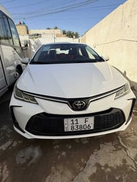 كورلا هايبرد 2025 شكل الخليجي داخل احمر فول مواصفات بحالة الزيرو السعر...