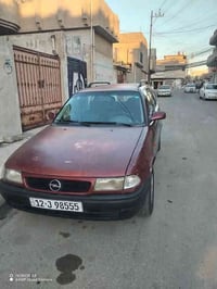 اخوان سياره استرا استيشن لون ماروني موديل 1997وارد خليجي  رقم نينوى مس...