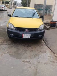 لانسر • ٢٠١٠ • كالار