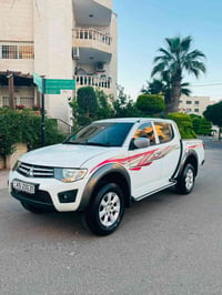 ميتسوبيشي 4x4 • بحالة الوكالة • ٢٠١٥
