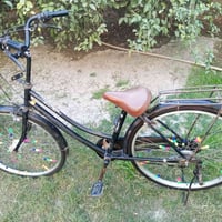 بايسكل للبيع حجم 26السعر 70وبي مجال رقم الهاتف 07823456740