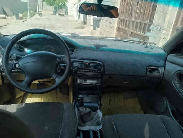 مازدا موديل 1993
گير عادى 
تبريته 
سلايته 
جام كاره بايه
گيرو مه كينه ى به شه رت 
براوه وه رگه ران به شه رت 
ارم پلاستيك و سه نه ويه 
تازه جوار تايه ى لو به سترايه 
33وه ره قه و معامه له 
***********
