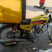 اربعة كير • اصفر • دراجة توصيل