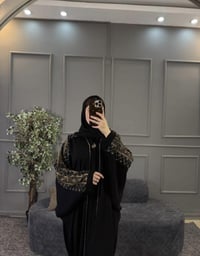 عباية رگلان • سواد فاحم • فري سايز ٥٠-١٠٠ كيلو