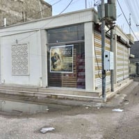 بنايه تجارية للبيع المساحة 100 متر ركن على شارعين تحتوي على 3 محلات وم...