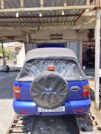 كيا سبورتج موديل 2000كير مكينه مكفولات سياره مصبوغه عام سياره ما ناقصه...