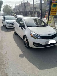 كيا ريو رقم بغداد موديل 2016 وارد امريكي محرك 1600 السعر 92 وبيها مجال...