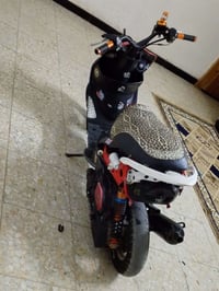 دراجه كامله مكينه مفتوحه بوشه 55 دراجه مال لعب السعر 450 بعنوان الرئاس...