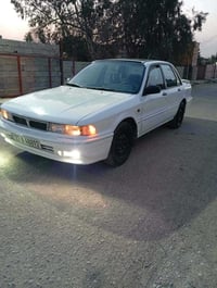 متسوبيش كلاند • رقم اربيل • قير ومحرك شرط