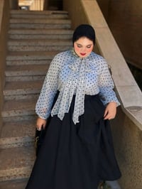 قميص منقط • ترند • الزهور والمثنى