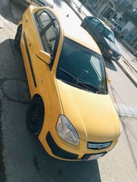 كيا ريو موديل 2009 رقم ديالى دولي شرط التحويل   كير شرط محرك شرط  ضرر ...