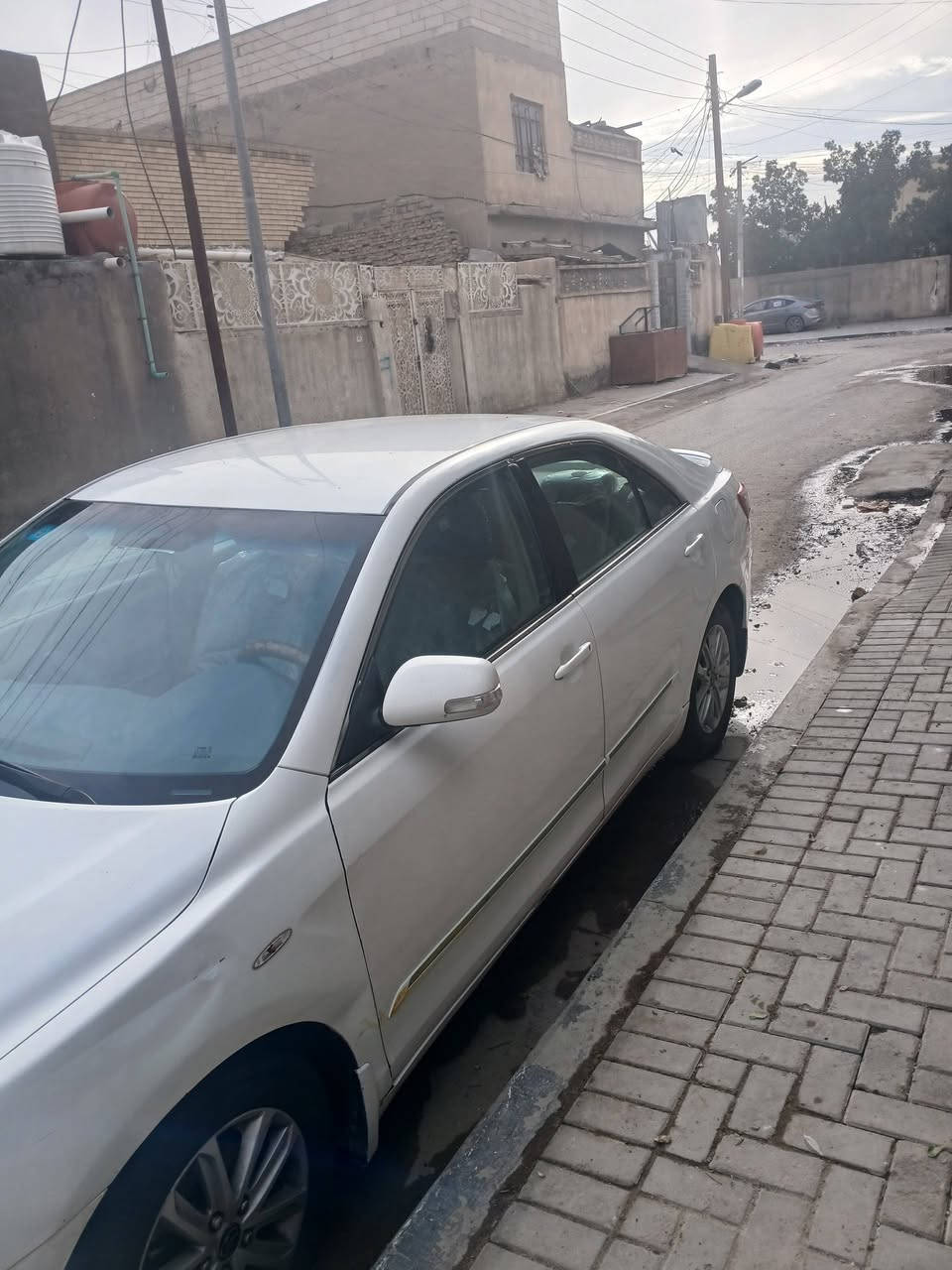 كامري خليجي ٢٠٠٧
فئة XLE 
محرك ٢٤٠٠ اربع اسلندر
تحكم استيرن جهتين
حدادي كيري 
سنويوجديد رقم بصره
بيه بس صبغ بل جملاغات ارباع يعني مو كل الجاملغ
وخيط تبخير بدون تنقيص
السعر ٨٨ ورقه وبه مجال
هاتف ***********
