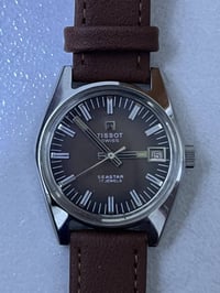 تيسوت • صنع سويسري • 17 حجر