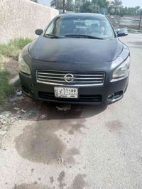 مكزما2010بغداد وارد امريكي بسمي فول مواصفات مصبوغه حزام محرك وكير مكفو...