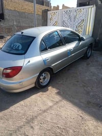 كيه ريو 2001رقم بغداد انكليزي مشروع وطني محرك 1600وكير اوتو مكفولات تخ...