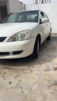 لانسر موديل ٢٠٠٩ مكفوله من الصبغ والمعجون والتبديل مكينه گير تبريد تدف...