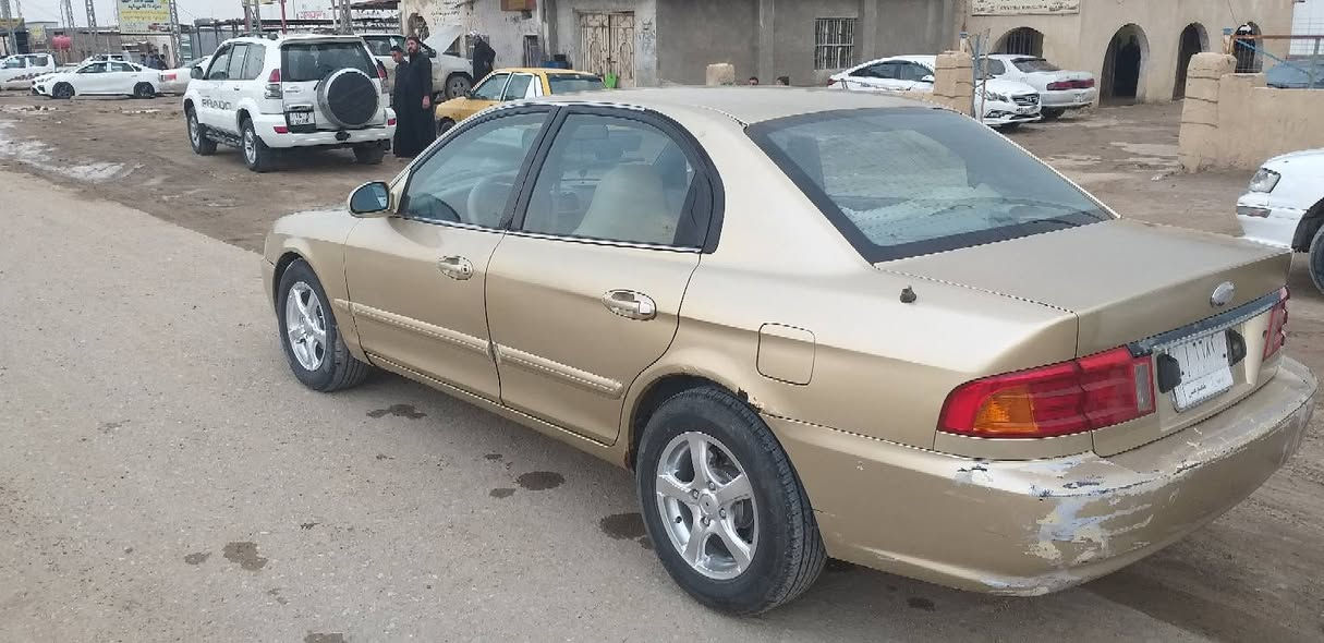 كيا اوبتيما مديل 200١ رقم بصره كير محرك حداده كهربايات تخم تاير خير من الله السعر ٣٥ العنوان قرنه بني منصور هاتف ***********
