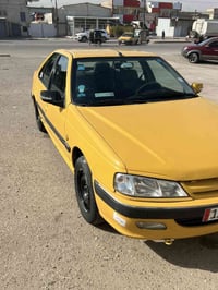 سياره بيجو بارص اللبيع بس الهلايل مصبوغات والباقي مكفول المكان بغداد ح...