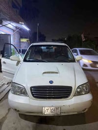 كيا كرنفال موديل 2006 /محرك گاز/ گير اوتوماتيك/ تبريد 3 قطع/ رقم بغداد...