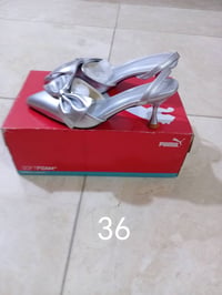 اي قطعة • ملابس