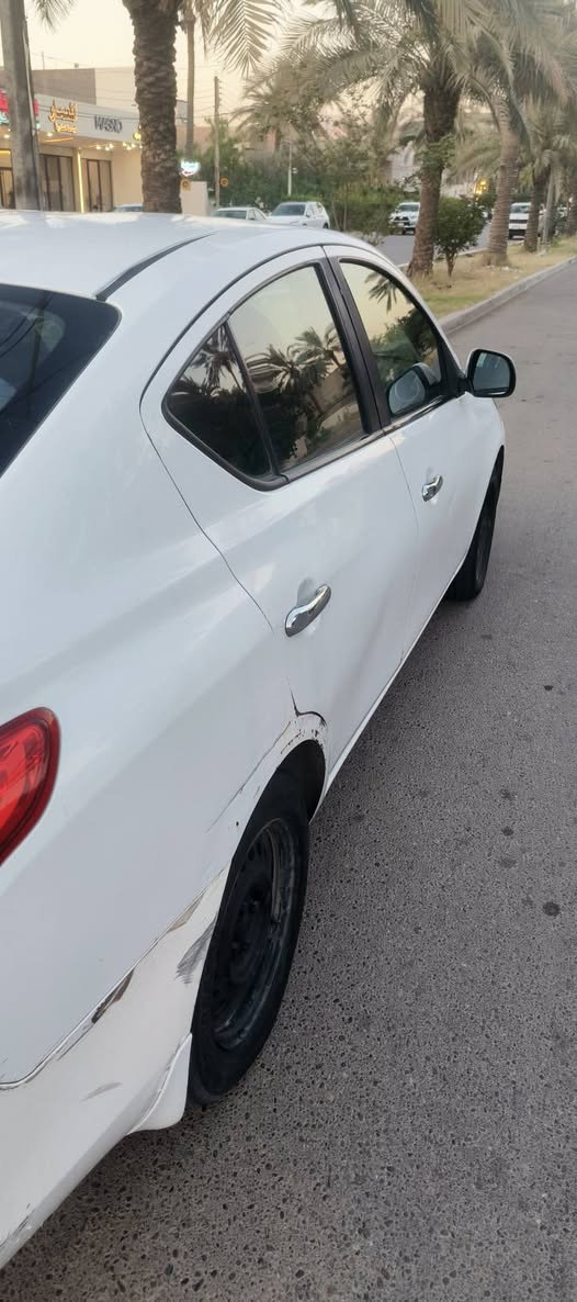 سلام عليكم للبيع نيسان فيرسا موديل ٢٠١٤ بيها قطعتين صبغ بدون دواخل دواخل كفالة محرك و كير كفالة بس بيها اذاين مال محرك سعرها ٥٠ الف غيرها اني اتحمل مس!ؤليتها ماشية ١٥٠ كيلو مكاني بغداد السيدية سعر السيارة ٧٣  ورقة و بيها مجال رقم الهاتف ***********
