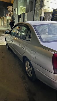 النترا 2003 خليجي سيارة بدون حادث مصبوغه عام بسبب الجراد وصوره عندي قب...