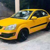 ريو تكسي للبيع  رقم بغداد انكليزي بسمي شخصيا مصفره هيئه وغرامه ضرر جام...