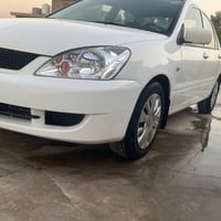 لانسر موديل 2010 مكفوله فقط الهلالات معمره سونار موجود السعر 88 وبيها ...
