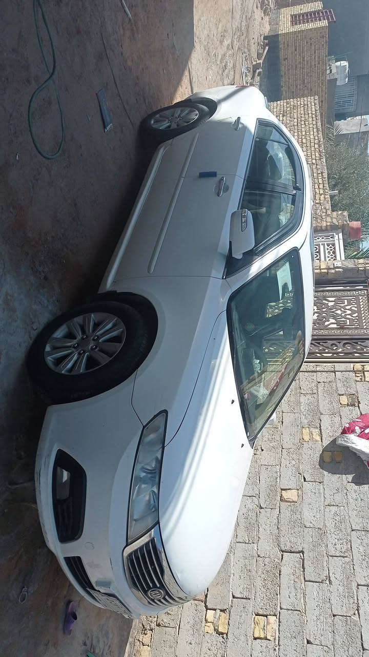 كيا اوبتيما موديل 2010 سياره باسمه رقم بغداد جديد    ***********
