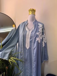 بوتيك الملكة • ملابس