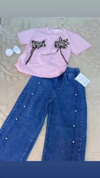 ملابس أطفال • ٦-١٢ سنة • وردي وأسود