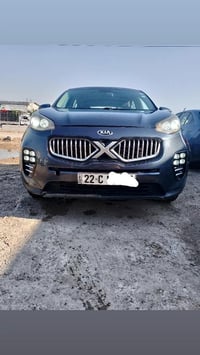 عيني كيا سبورتج2018 امريكيه حادثها بنيد وجاملغ الايسر ومبدلات شركه نفس...