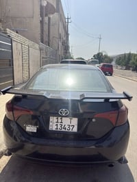 كورلا 1800 LE موديل 2018 بيها قطعة بنيد مبدل او مضروب فابلون وبيها بار...