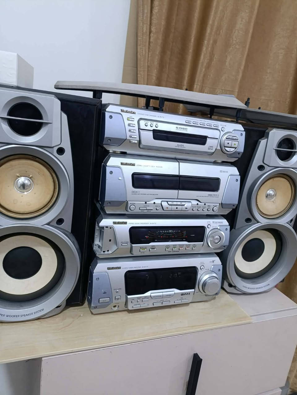 سستم تكنكس ياباني شغال راديو مسجل اوكس  السعر 200التواصل  على الرقم ***********
