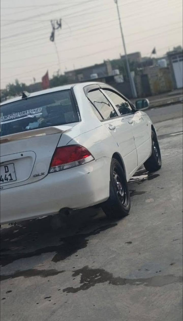 سلام عليكم لانسر ٢٠٠٩ البيع السيارة حلوة او خير من الله مكينة كير صدر كلة حلو منقصهة شي وين متريد اطلع السيارة مصبغو عام او السونار منشور  السيارة شاشة او كامرة مري كهربا جام كهربا  السعر٦٩ الستفسار ***********
