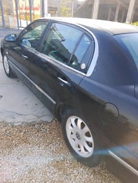 كيا اوبرس • ٢٠٠٥ • رقم بابل