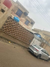 مدينة الصدر أربعمئة دار • بيت طابقين • ٢٠٠م