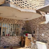 بيت للبيع طابو صرف   مساحه ٢٠٠م   مكانه فتاحيه شارع المركز  قريب عله م...