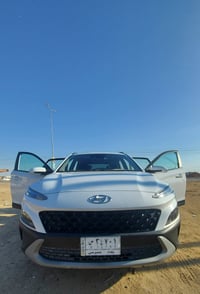 للبيع هونداي كونا لون ابيض موديل 2023  وارد امريكي بصمة / رقم بغداد   ...