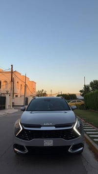 سبورتج sx برستيج  لون سمنتي داخل احمر   مكانها بغداد فول مواصفات  بانز...