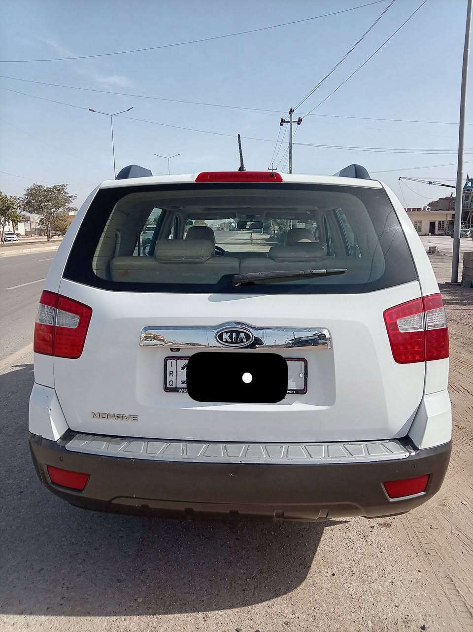 كيا موهافي ابيض خليجي فول
موديل ٢٠١٢ 
٧ راكب 
٣ قطع تبريد 
مري شفط 
تحكم ستيرن 
فتحة سقف
بصمة
لايت لد ابيض
كراسي كهرباء
رقم انكليزي 
مكان السيارة : الرمادي 
السعر : ١٥,٠٠٠$ 
للتواصل : 
*********** 
***********
