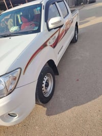 سياره هايلوكس موديل 2011 رقم وسنويه بغداد مجدد رقم الإنكليزي السياره ج...